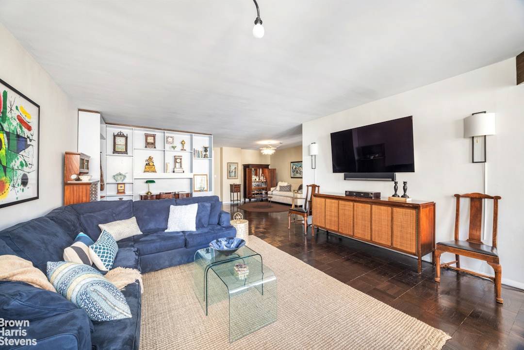 Residence 12C at The Townsend House is a rarely available, sun drenched two bedroom, 2.