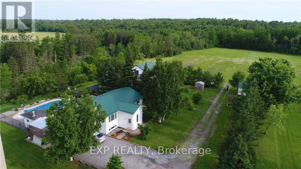 Experience luxury country living with in town convenience in this rare, fully renovated home on a beautifully treed lot, just shy of 5 acres in Verner.