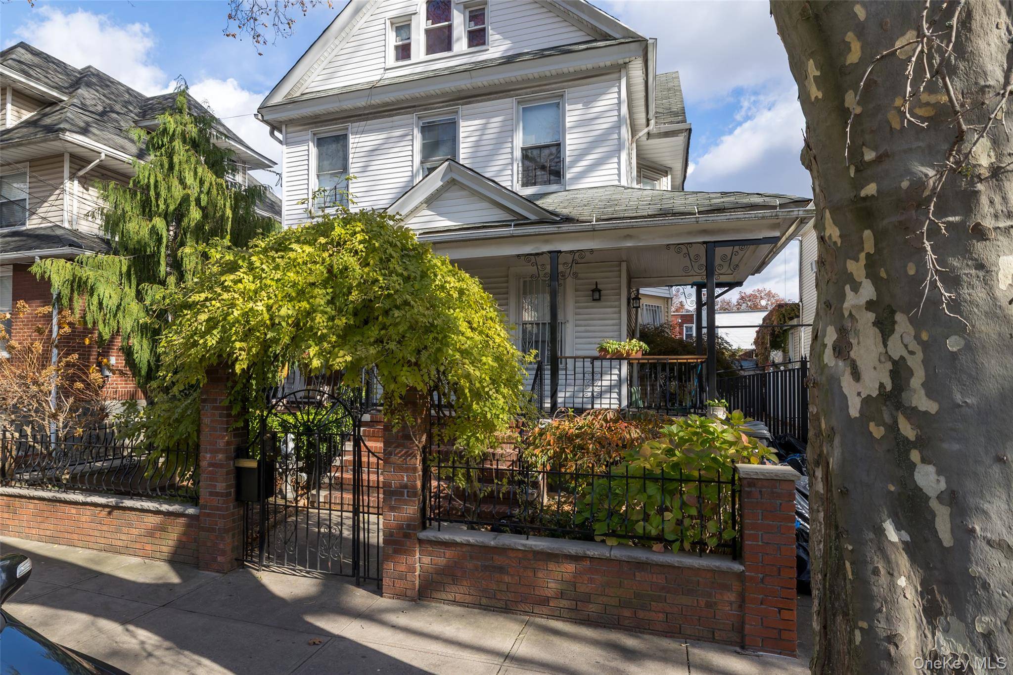 Large 2 Family Detached Colonial With A Rare, Private And Beautifully Landscaped Backyard With A 40'X101' Lot.