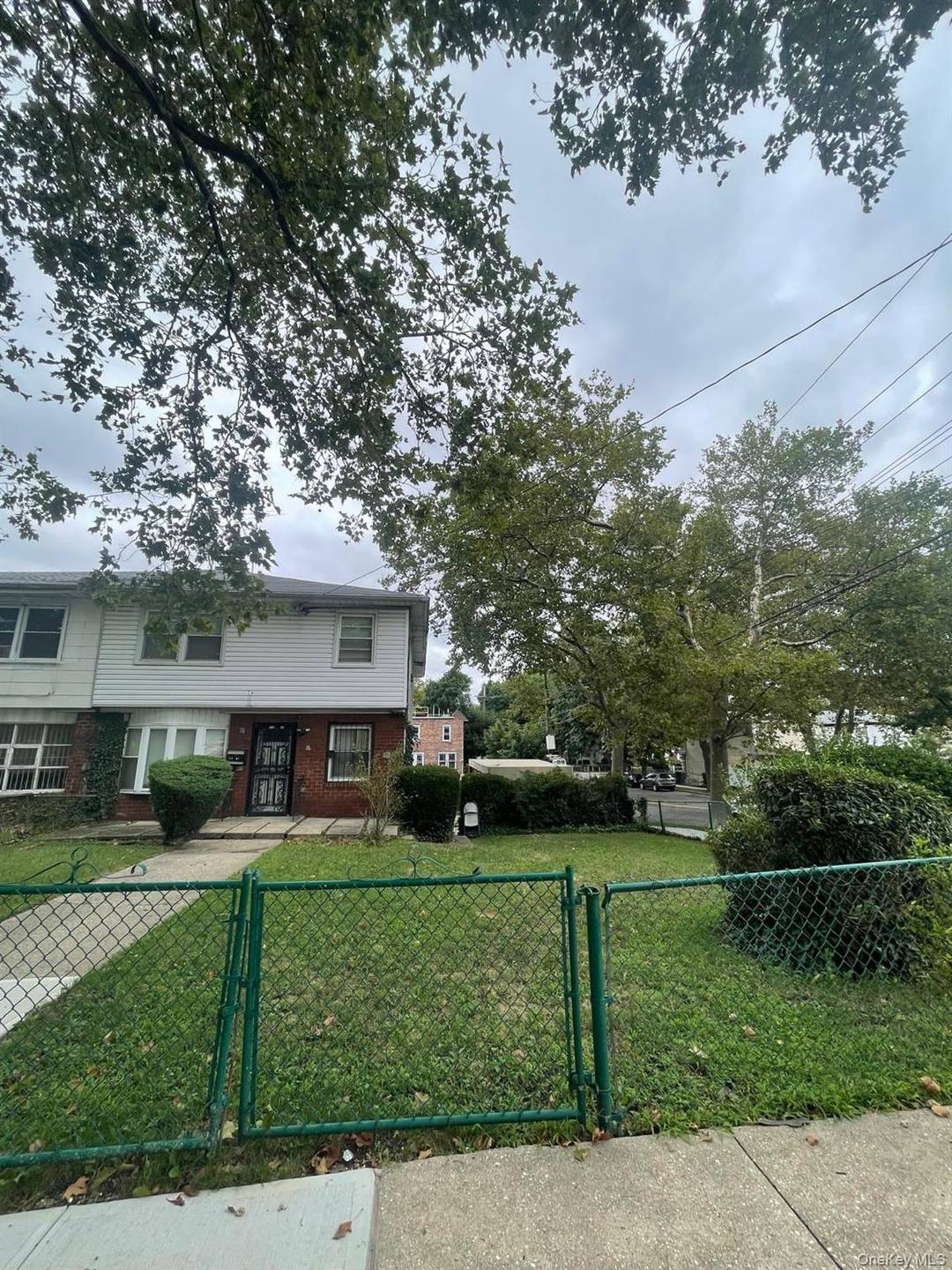 Well maintained two family residence located in the desirable Jamaica, Queens area, offering a total of 4 bedrooms and 2 bathrooms with a spacious and functional layout.