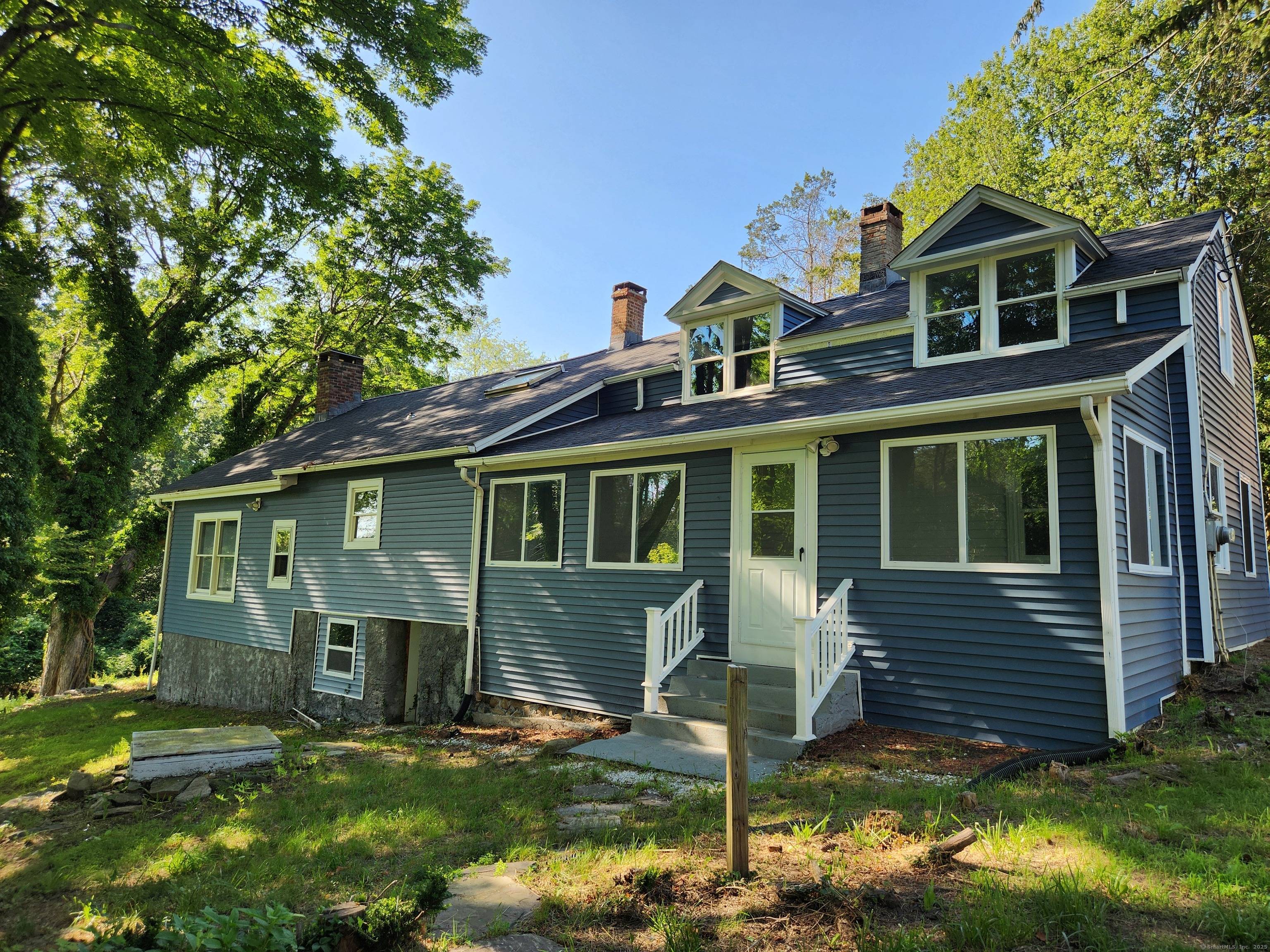 Welcome to this beautifully renovated Cape in the heart of Trumbull.