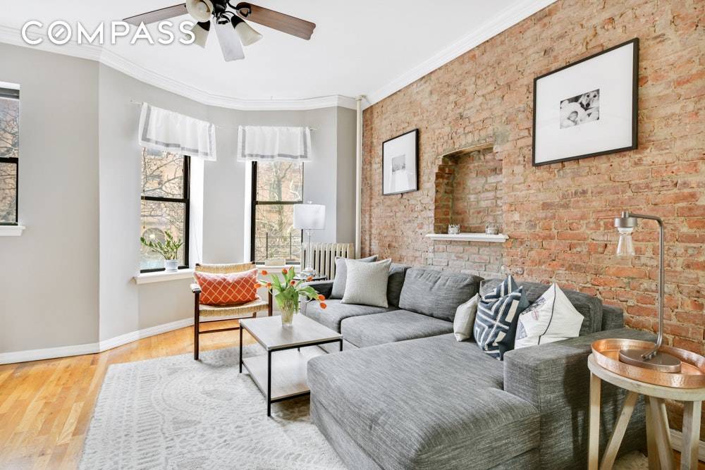 This warm, modern and charming two bedroom home in an eight unit pre war co op offers wonderful space and a fantastic location in Park Slope !