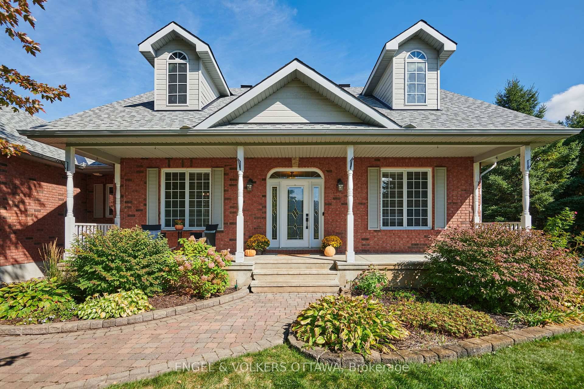 Picture perfect bungalow offers fine country living on over half an acre 0.