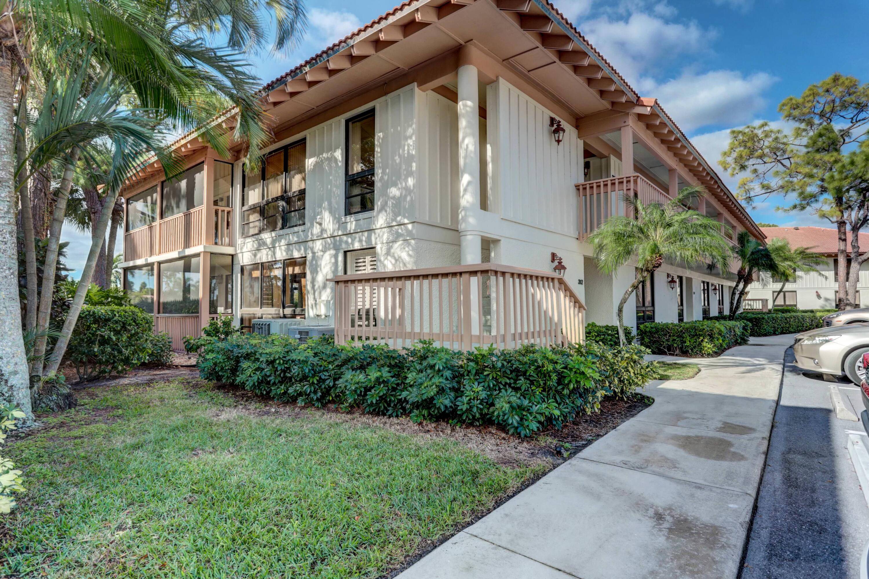 Enjoy a scenic view of the second fairway of the Championship Course from this stylish, furnished, 2nd floor condo at PGA National.