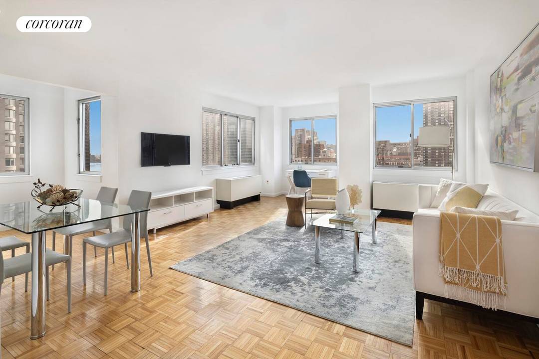 This two bedroom, two bath home has an expansive living and dining room with views of the East River, lower Manhattan and Empire State Building.