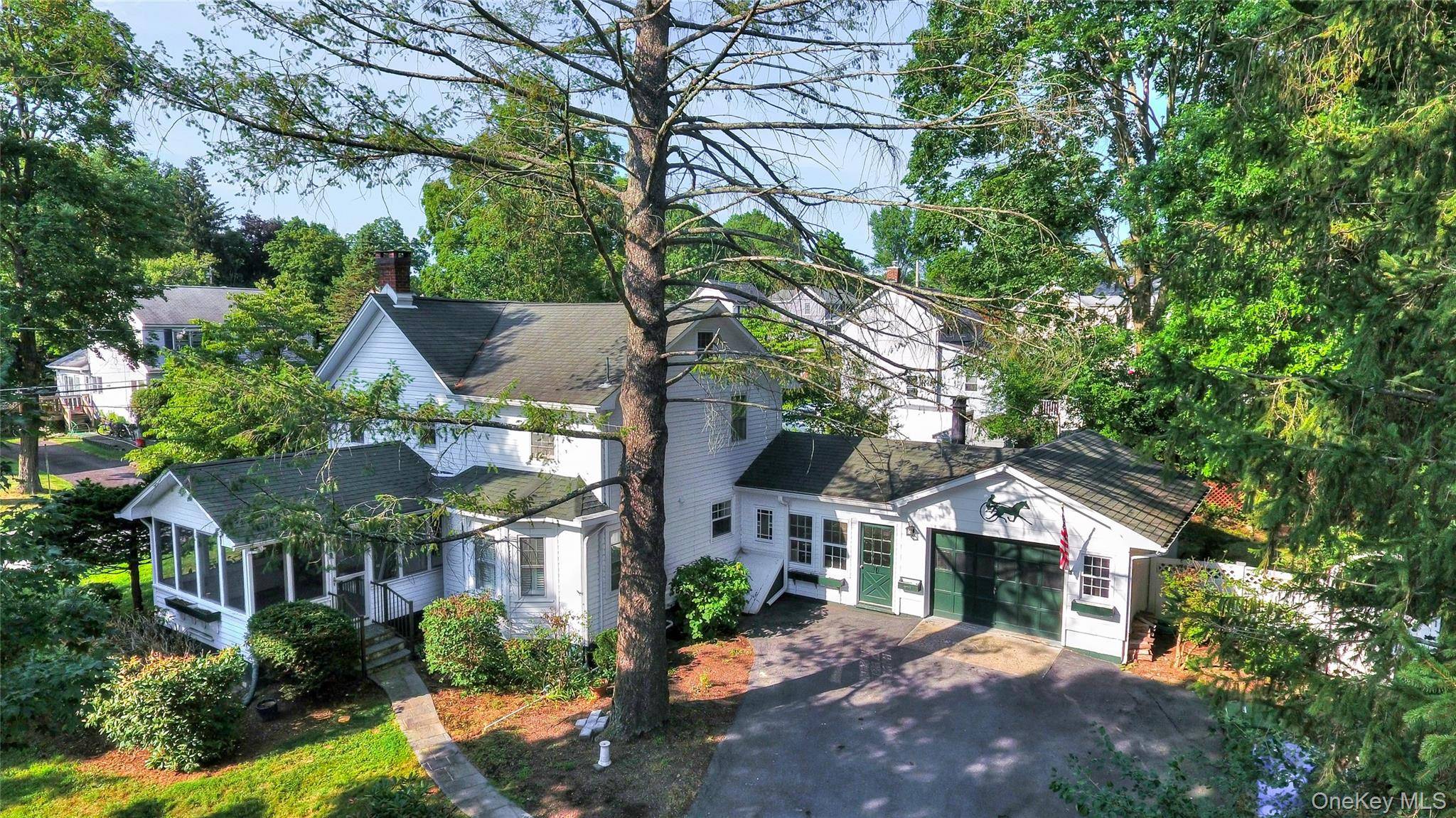 Located in the heart of the historic Village of Goshen, this charming 3 bedroom, 2 bath home blends timeless character with modern comfort.