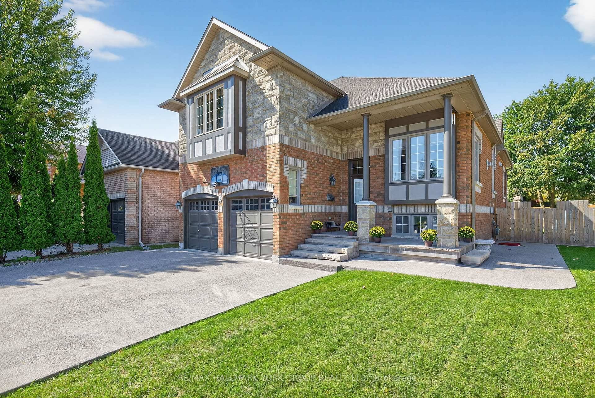Stunning raised bungalow with 2 primary bedrooms with ensuite baths, perfect for multi family living.