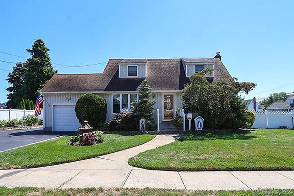 Welcome To This Beautiful Oversized Corner Lot Perfectly Situated In The Desirable Westwood Section of Massapequa Park !