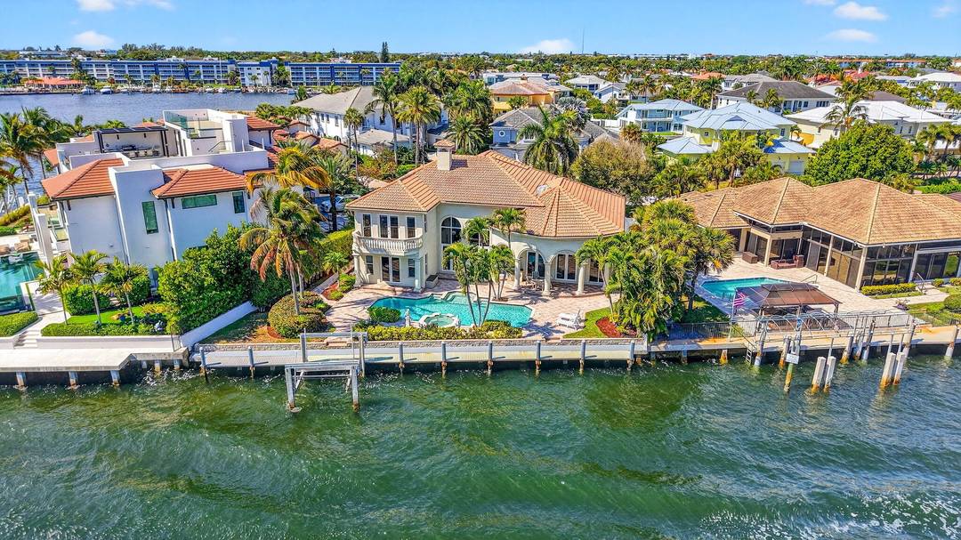 Experience refined waterfront living in this beautifully updated and meticulously maintained direct Intracoastal estate in the prestigious Tropic Isle community of Delray Beach.