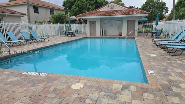 Waterfront 3bed, 2, 5 bath gated community of Pembroke Falls, 2 car garage, 4 cars driveway, Backyard with patio, 1 4 miles walking distance to the water park, Soccer club, ...