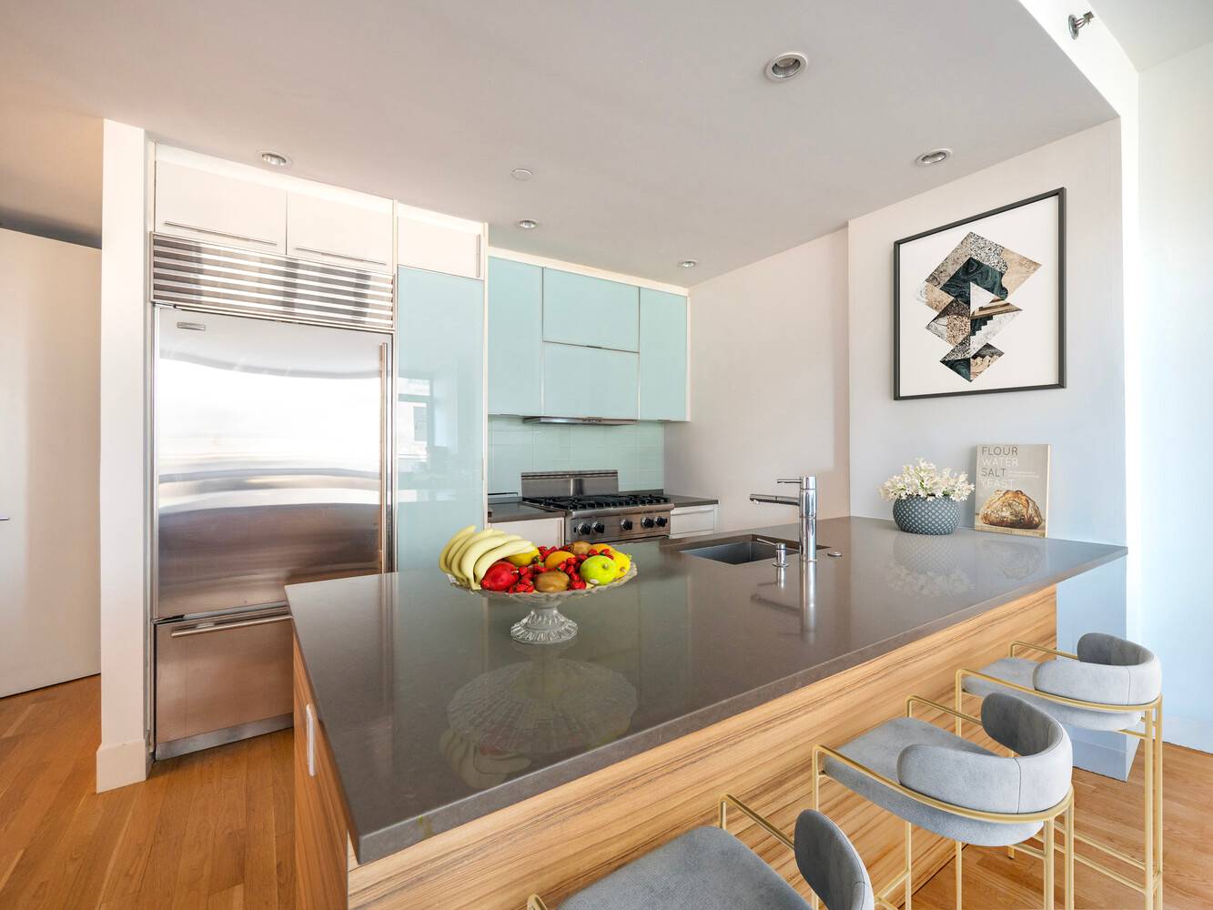 This beautifully proportioned two bedroom, two bath residence captures abundant southern light through floor to ceiling windows and glass doors that open to private balconies off both the living room ...