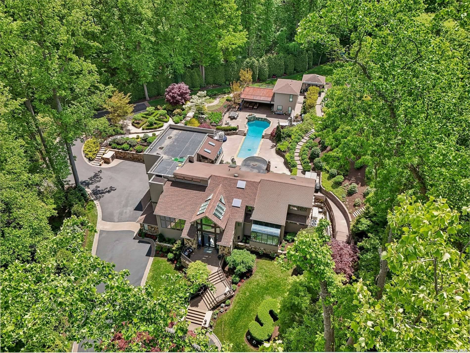 10K sqft of luxury living at this truly one of a kind gated compound set on 2.