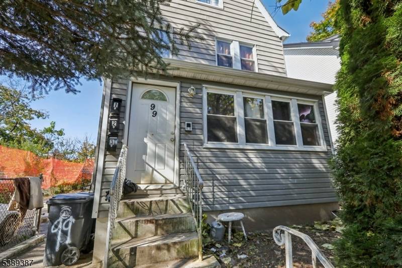 Spacious three family home offering approximately 2, 100 sq ft of living space on a 2, 500 sq ft lot.