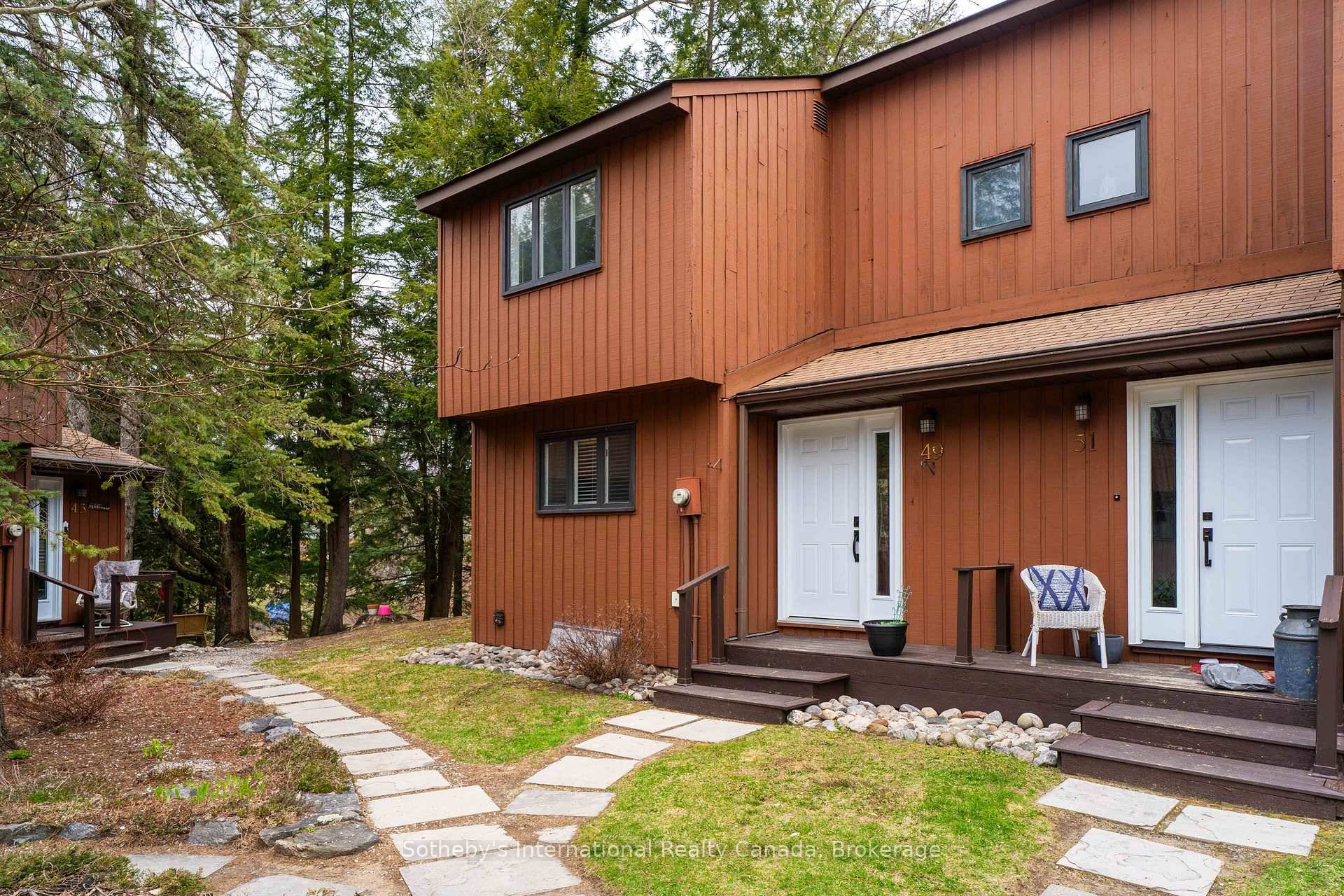This rare to market, corner unit townhouse offers unmatched waterfront living with the Muskoka River right in your backyard !