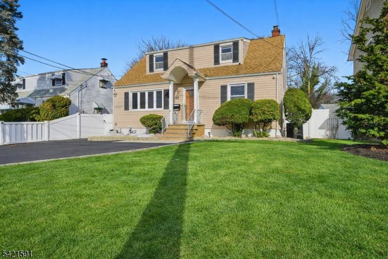 Welcome to 52 Broadway in Clark an inviting, move in ready Cape offering the perfect blend of charm, space, and flexibility.