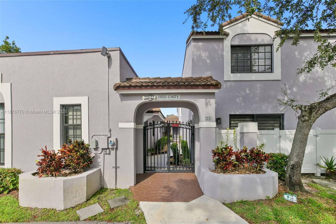 Welcome to this charming 2 bedroom, 2 bathroom home nestled in a fully gated community in the heart of Pembroke Pines.