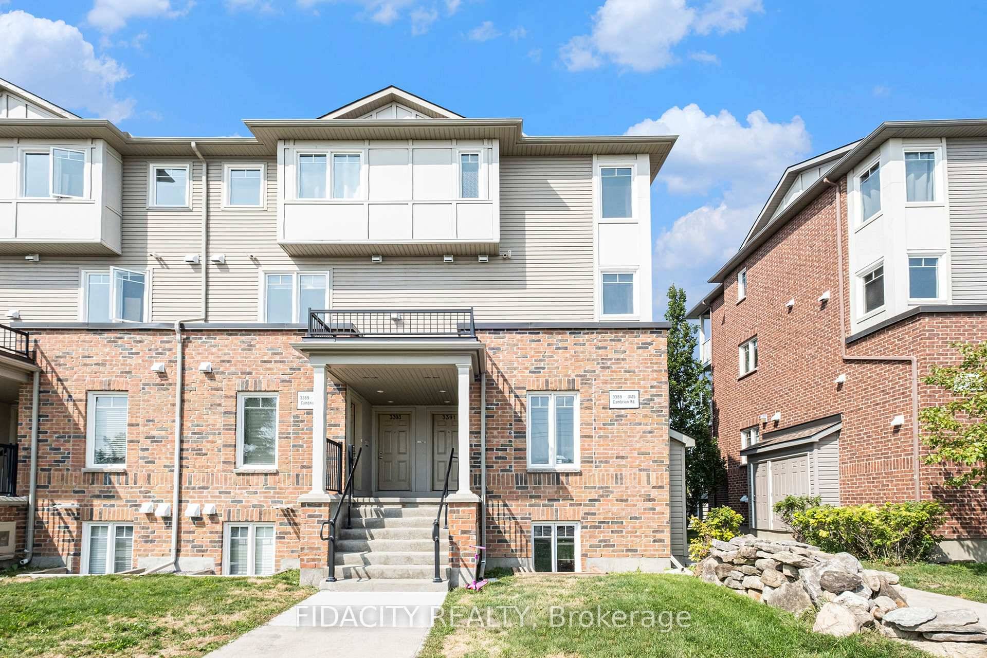 Bright upper corner unit with 2 parking spots a Rare Find !