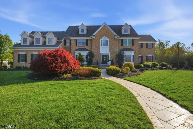Welcome to this custom built colonial masterpiece showcasing a perfect blend of luxury, elegance, resort style living, Located in a serene cul de sac less than a mile from charming ...