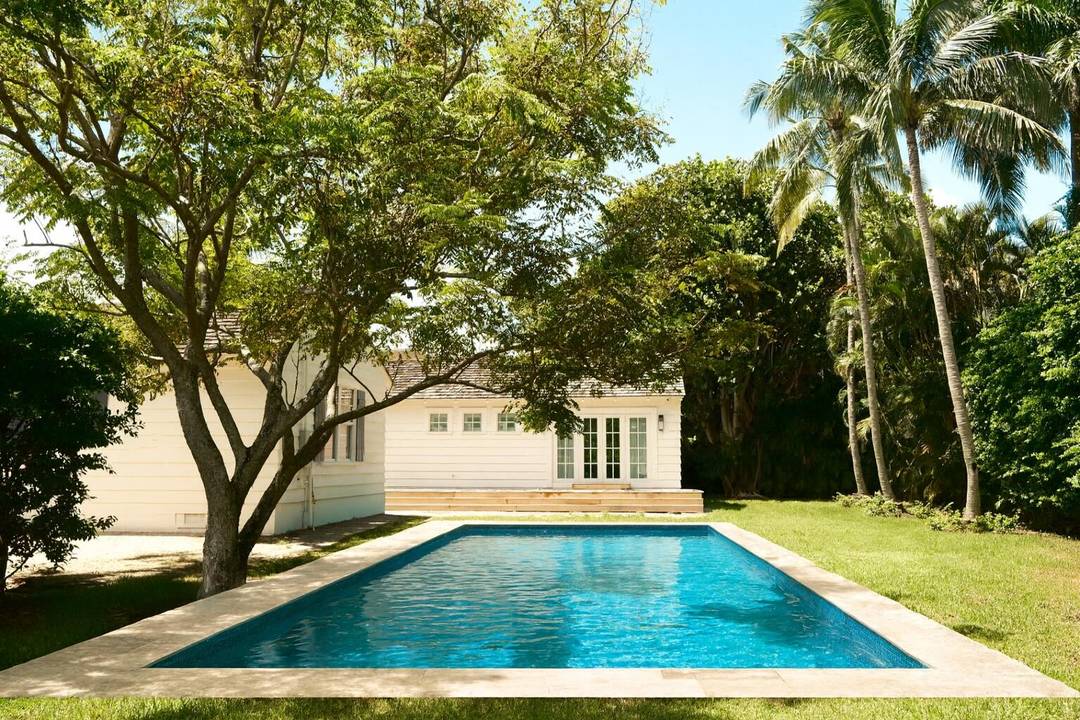 Just one block from the beach and a short stroll to Atlantic Avenue, this one of a kind residence sits on one of the most private and expansive corner lots ...