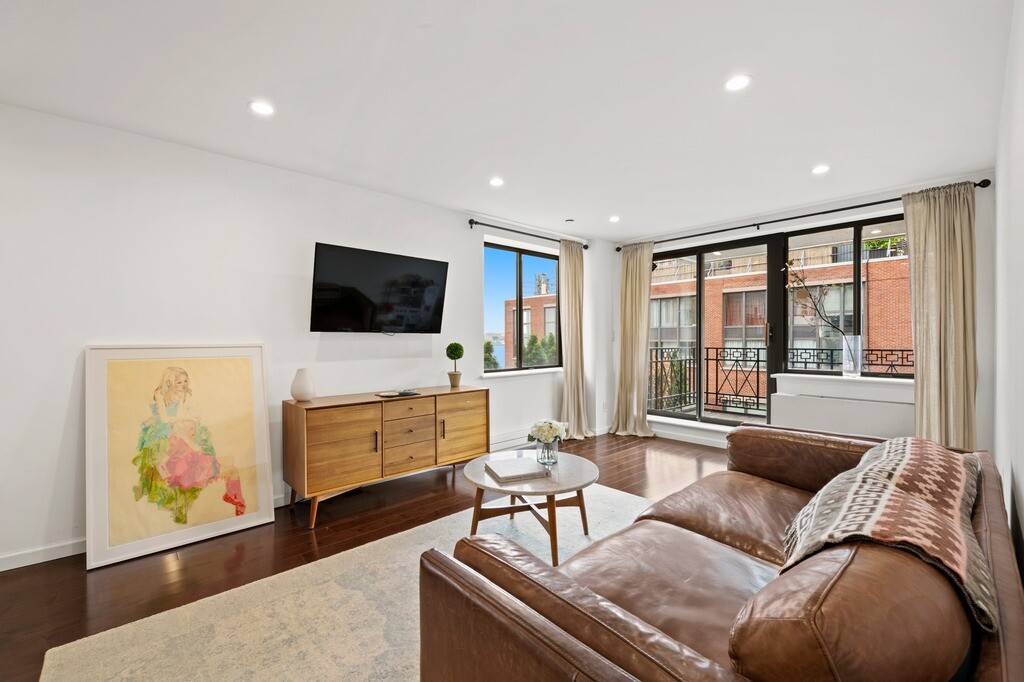 West Village Condo with Hudson River Views, Private Balconies Full Service Living Welcome to the West Village where timeless charm meets modern luxury.