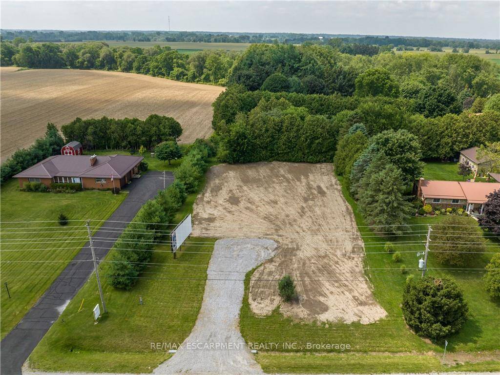 Ideally situated 120 x 207 Simcoe building lot on the outskirts of town !