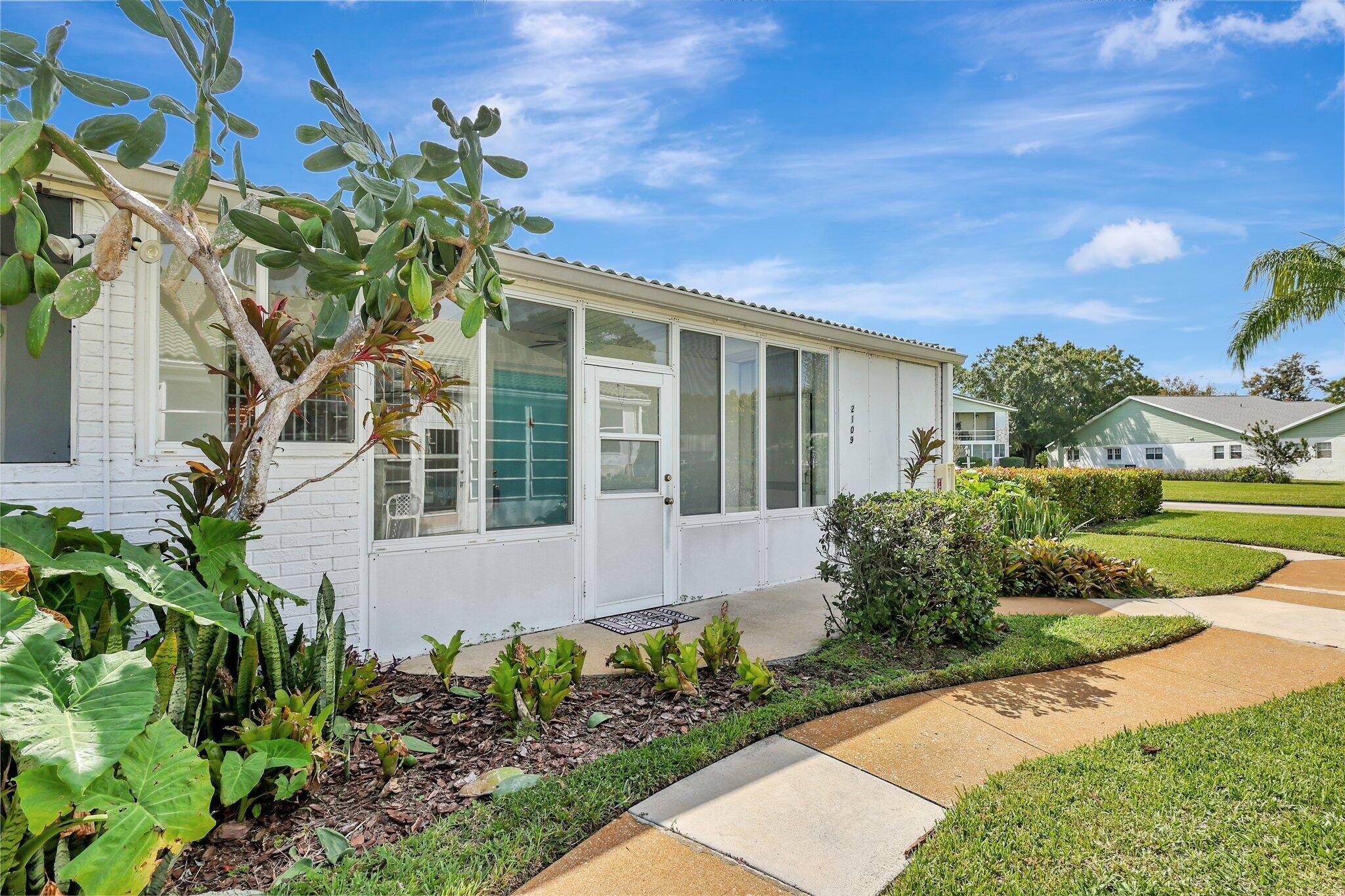 Welcome to this charming 2BR 1BA attached villa, catering to all ages, nestled in Kingman Acres.