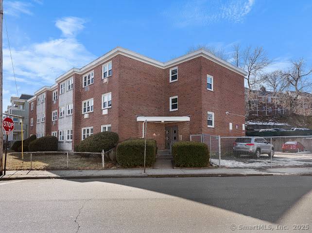 Seize this exclusive investment opportunity at 191 Oak Street in Bridgeport, CT, now available through Top Tier Realty Group.