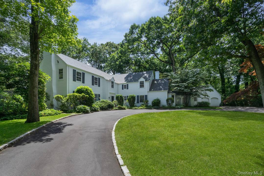Welcome to this charming Center Hall Colonial, perfectly situated on flat, verdant property just moments from the Town of Huntington and the picturesque Village of Cold Spring Harbor.