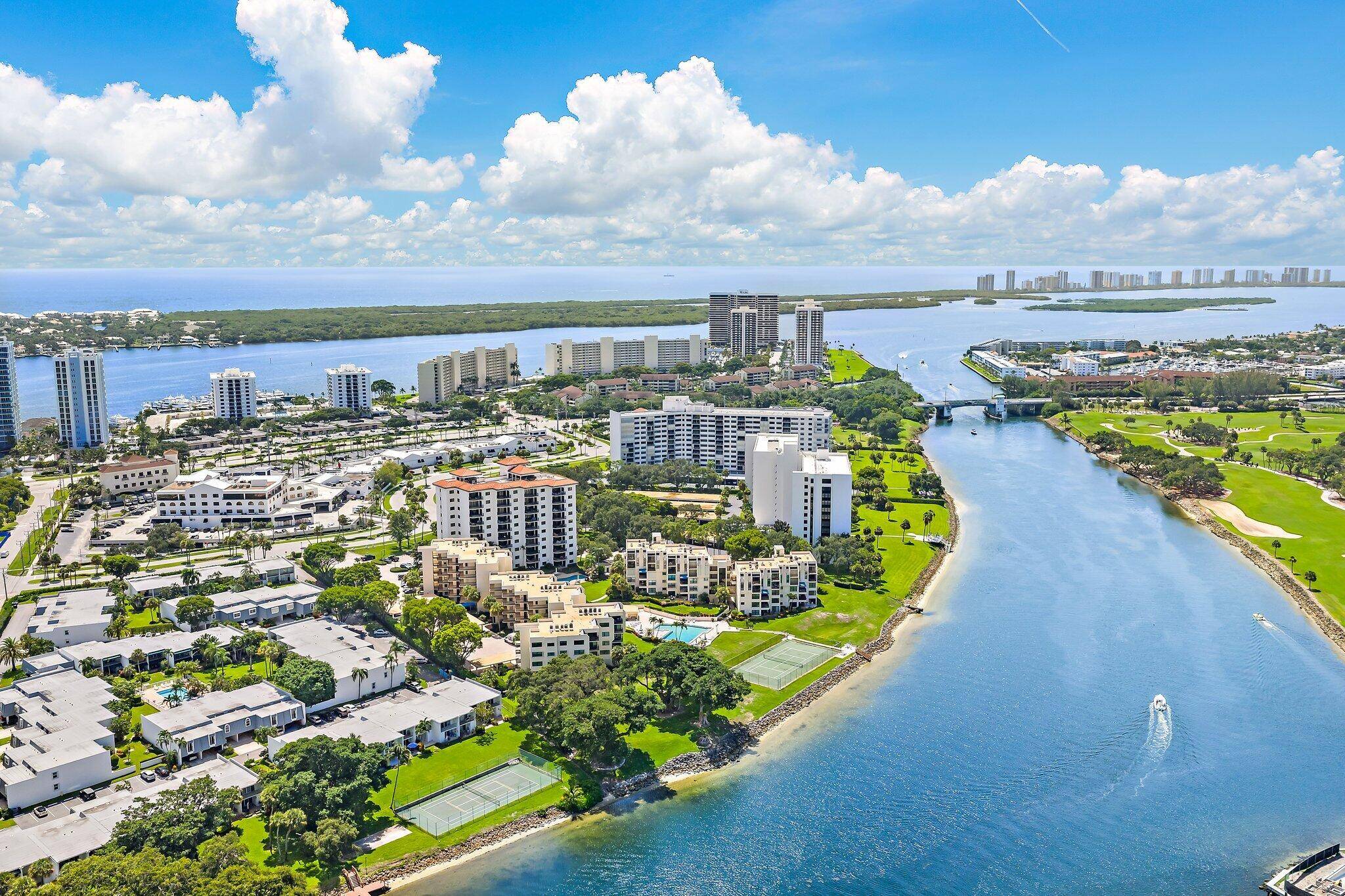 Experience elevated coastal living in this impeccably renovated waterfront residence at Seamark, North Palm Beach.
