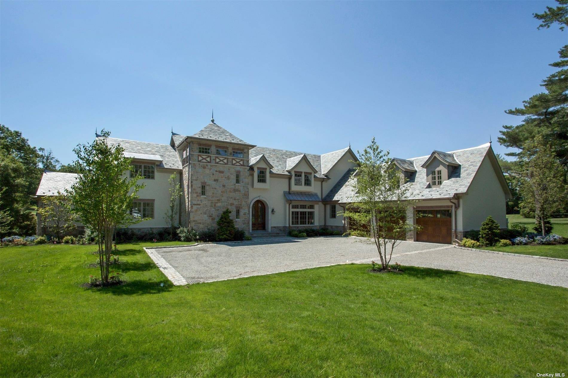 European style Manor home on 2 bucolic acres.