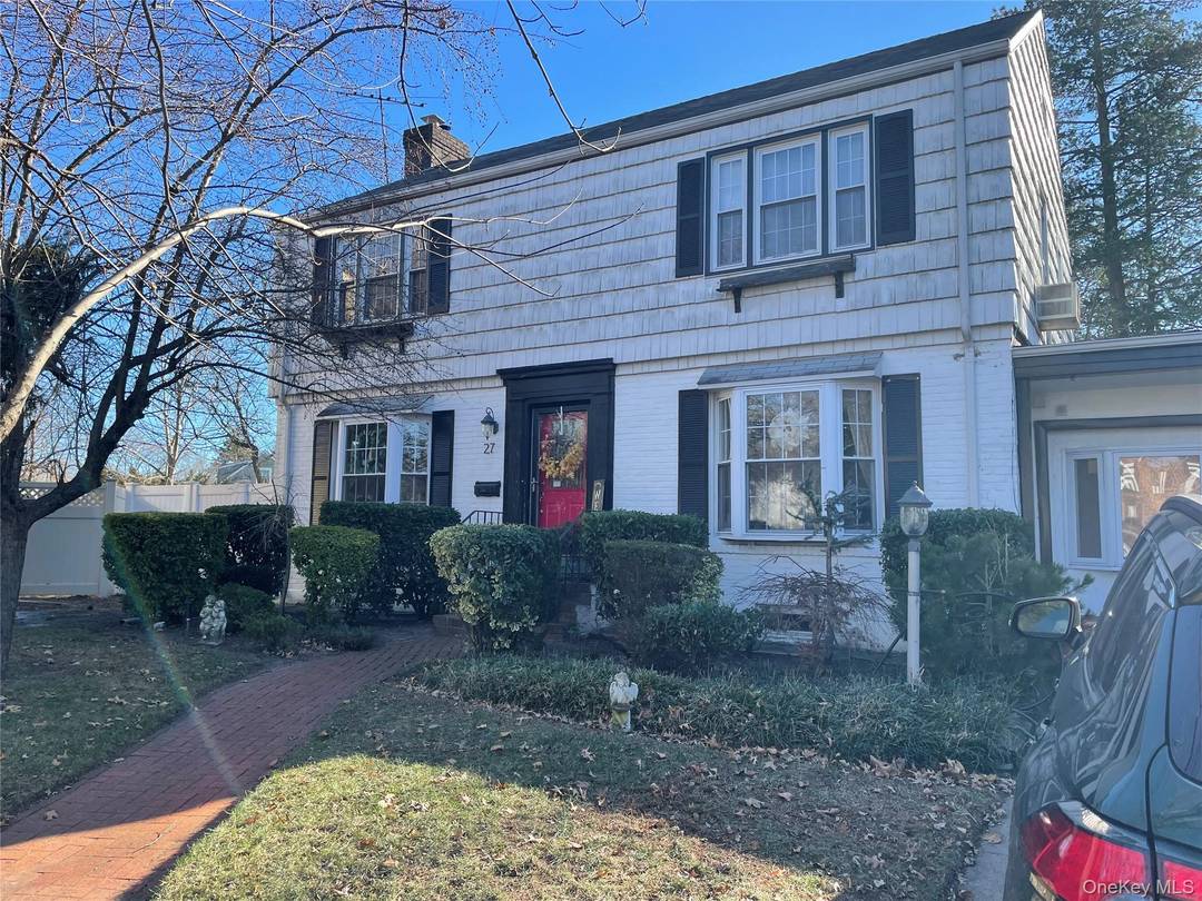 This exceptional, unique center hall colonial is situated in the prestigious Mill Brook section of Valley Stream.