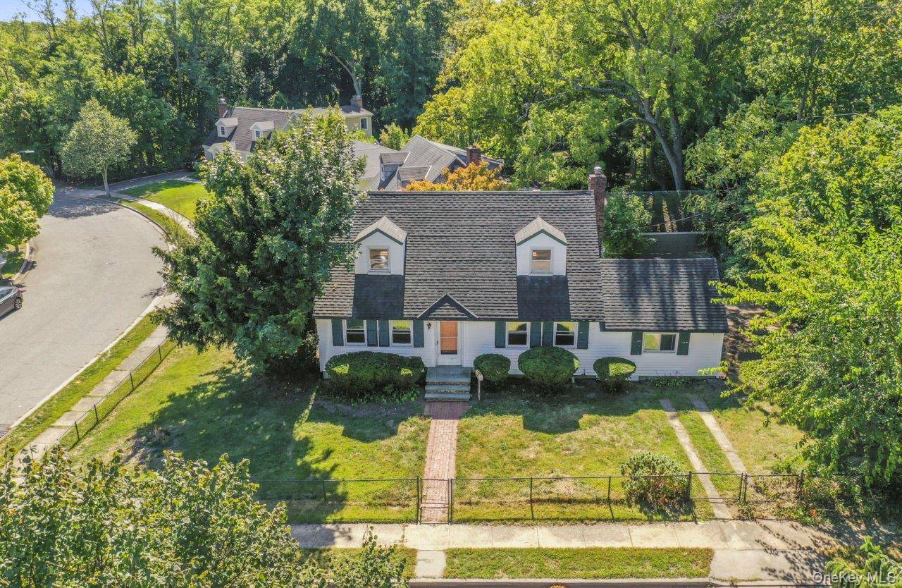 Welcome to this charming 4 bedroom, 2 bathroom home located on a quiet street in the Oyster Bay School District.