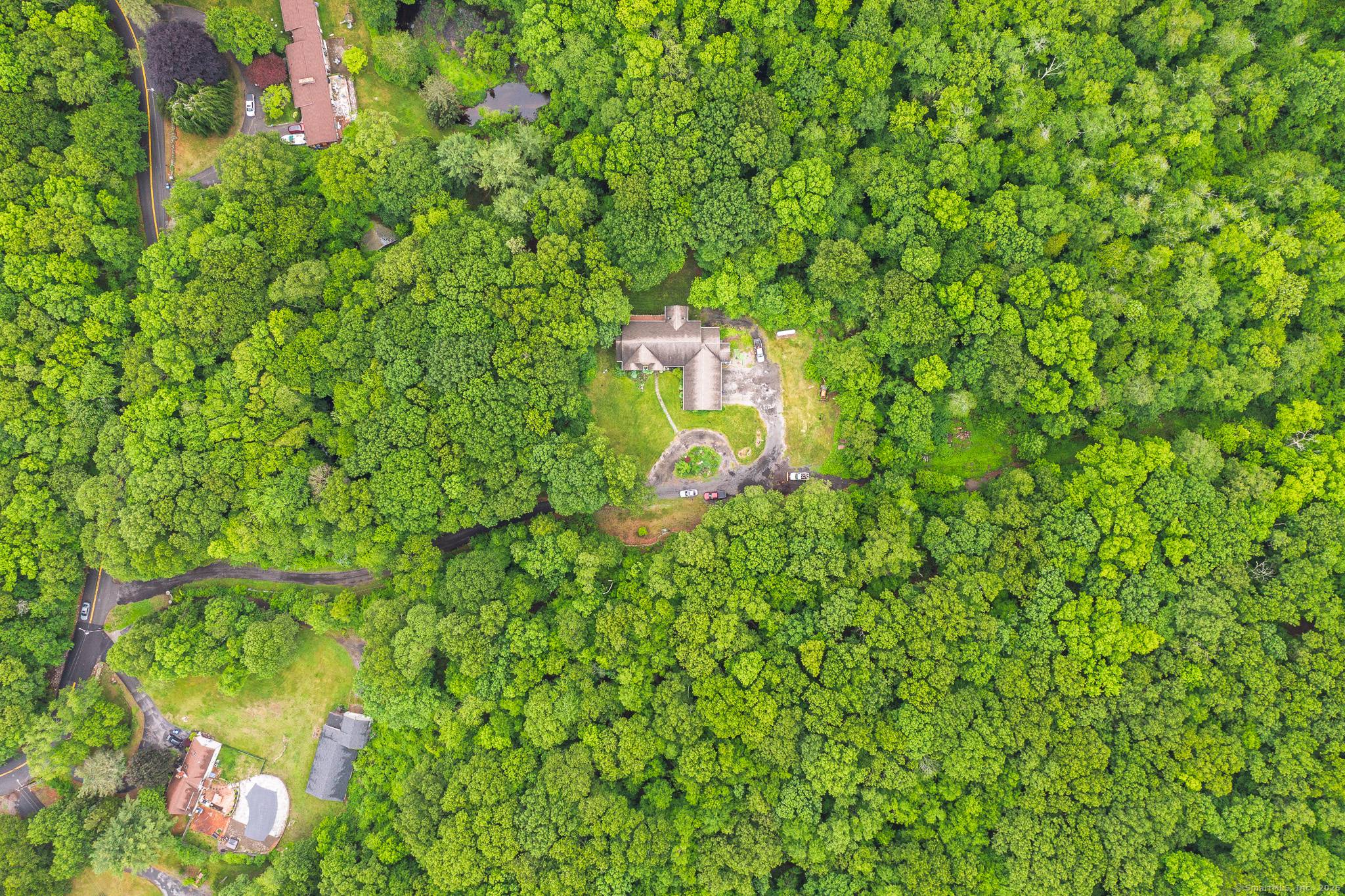 This completely private, one level Ranch in Cranston, RI offers a spacious and thoughtfully designed layout, beginning with a large foyer that opens into an expansive living room featuring a ...