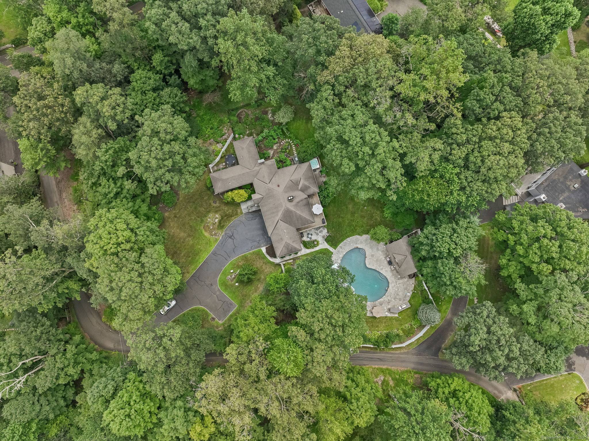 Private North Stamford Oasis w Over 250K in Premium Upgrades Nestled in a serene secluded setting, this beautifully maintained North Stamford retreat offers resort style living at its finest.