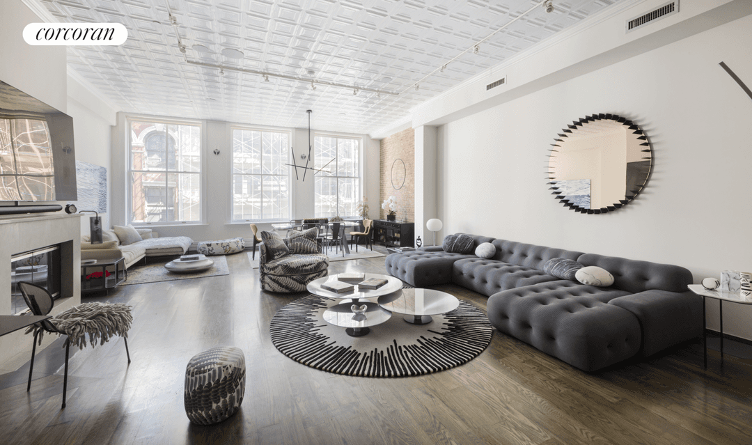 This downtown home with soaring ceilings is the definition of NYC loft living.