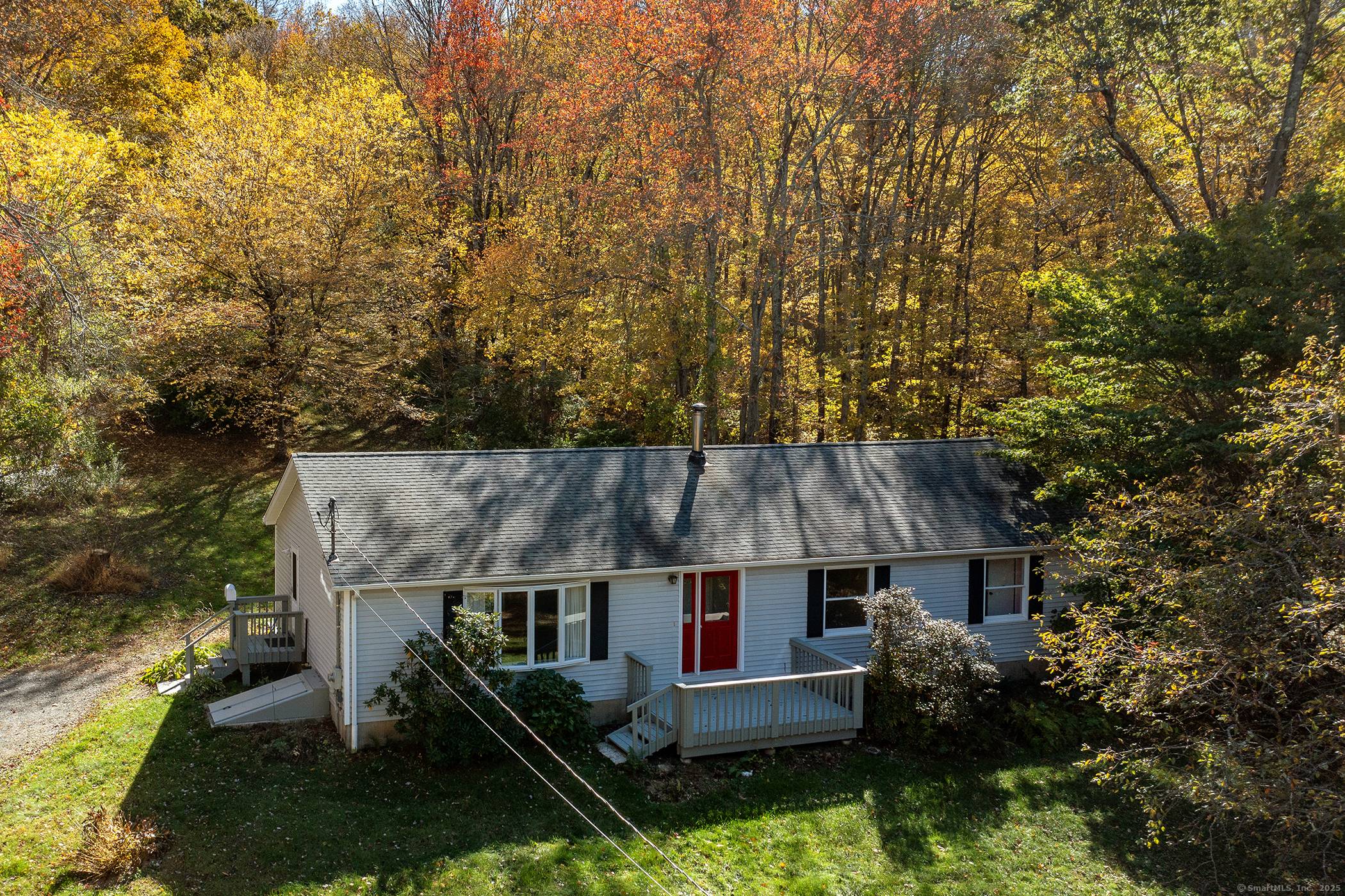 Exceptional 25 acres across two parcels in New Preston with town beach rights to Lake Waramaug.
