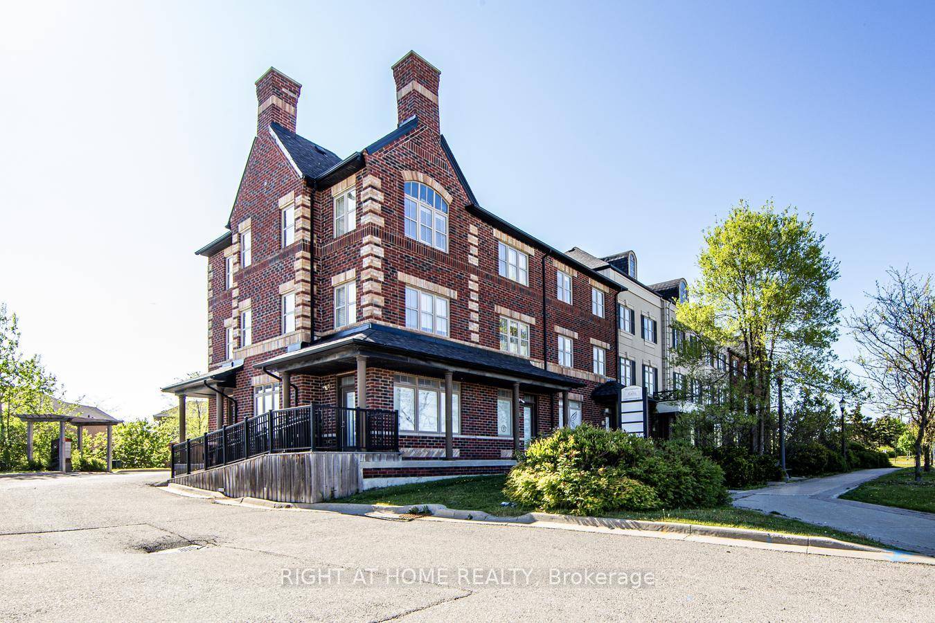 Immaculate 4 Bedroom Freehold Townhouse with Double Car Garage amp ; Visitor Parking.