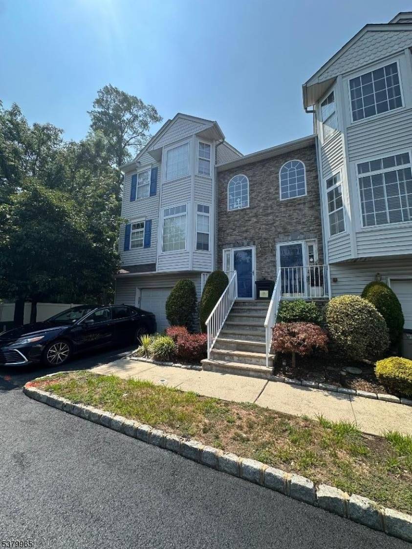 Welcome to this multi floor end unit Condominium located in the heart of Rahway.