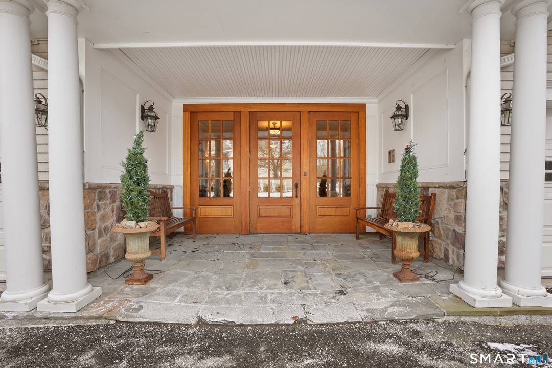 Two bedroom, two and half bath garden level ranch style condo that lives like a private home.