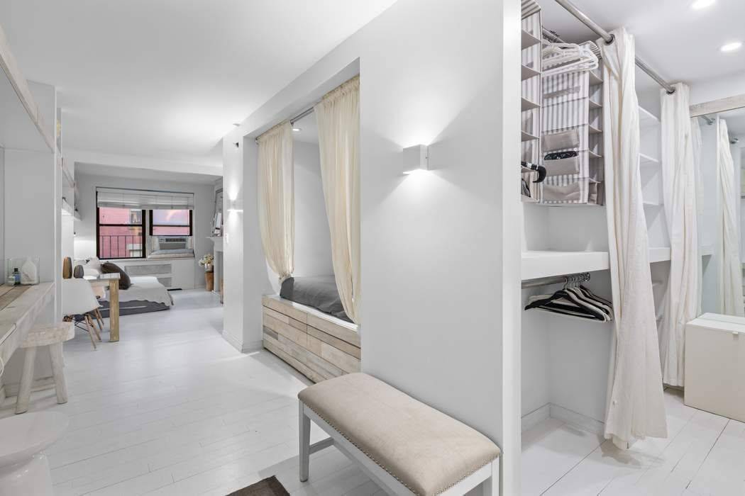 Glamorous extra large studio adorned with beautiful details, flooded with sunlight, perfectly renovated, and offered completely furnished.