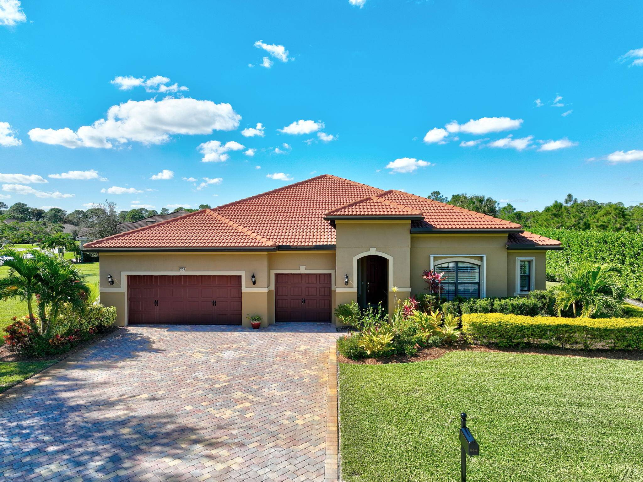 Welcome to your new home in the highly desirable, gated community of Copperleaf in Palm City, Fl.