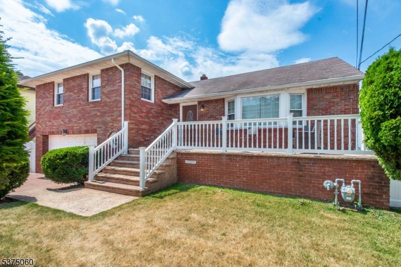 Welcome to 22 Mount Pleasant Ave a beautiful split level home offering comfort, space, and style in a prime Woodland Park location !