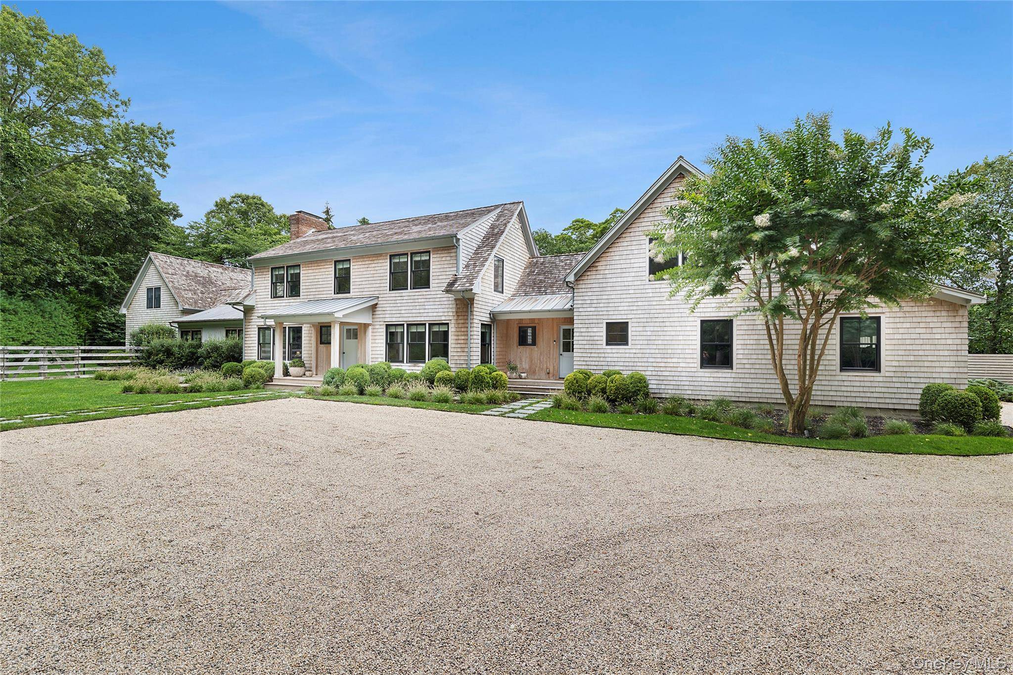On a quiet cul de sac just moments away from East Hampton Village and ocean beach, this interior designer's own residence has been thoughtfully reimagined with updates that blend modern ...