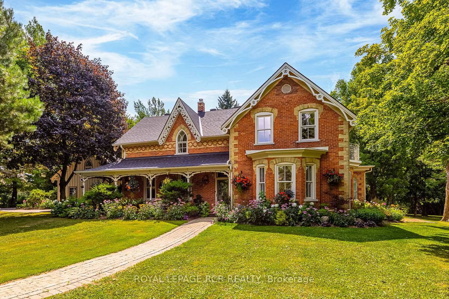 Peace and Tranquility ! This stunning country estate with over 5, 400 sqft of living space and Grand River frontage exudes elegance and class.