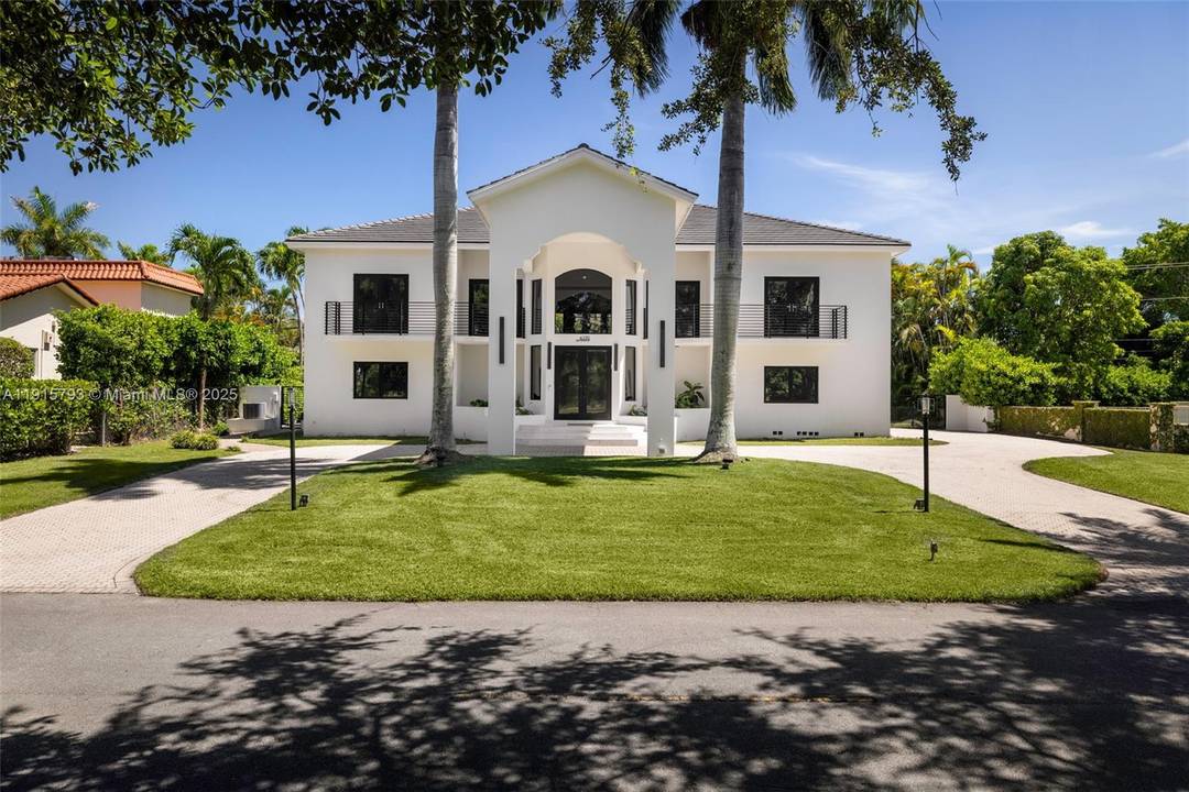 A striking modern residence in the prestigious, guard gated Kings Bay community.