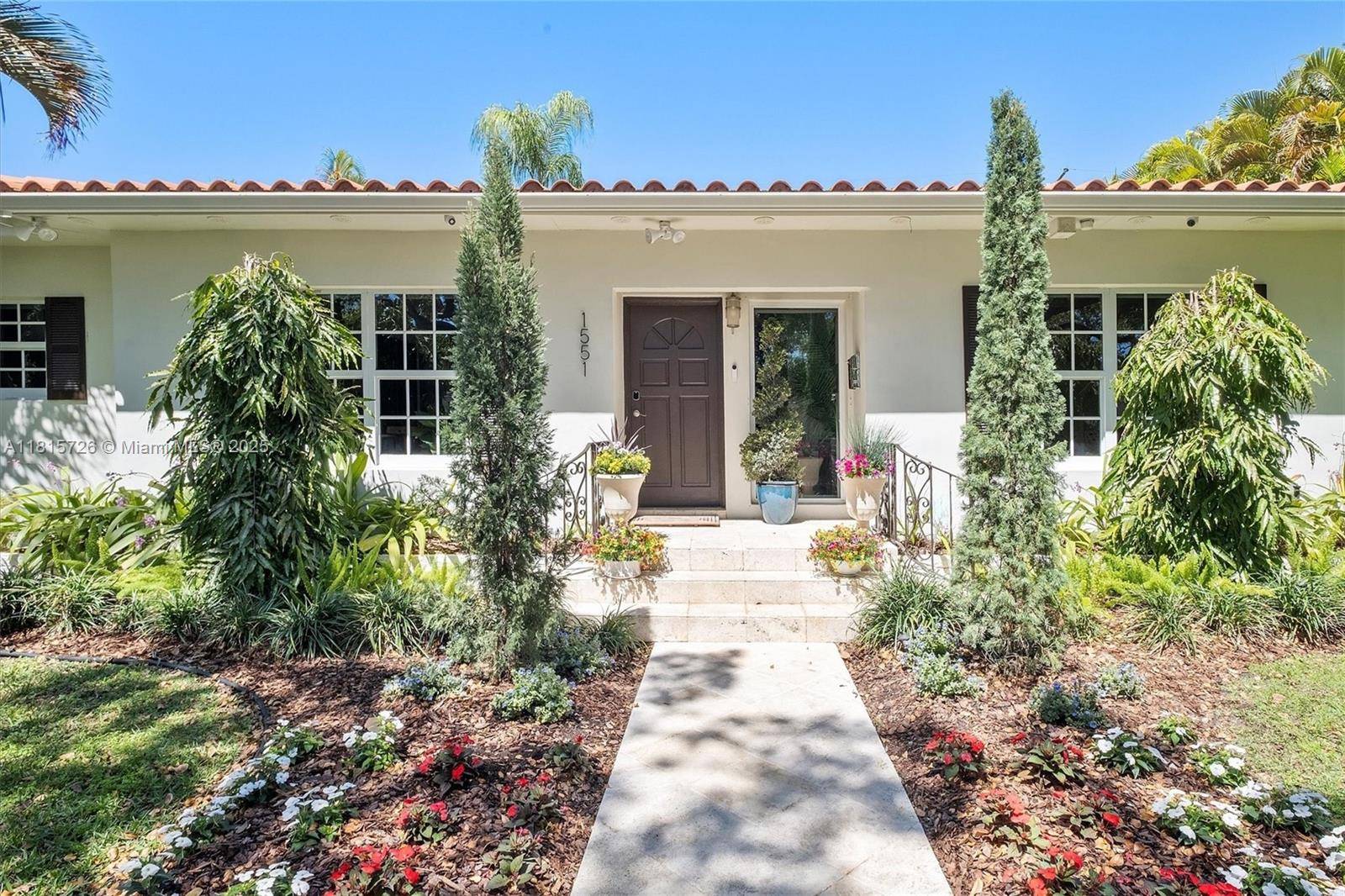 Welcome to this beautifully remodeled home on an oversized corner lot along a peaceful, tree lined dead end street in Coral Gables' coveted Riviera section.