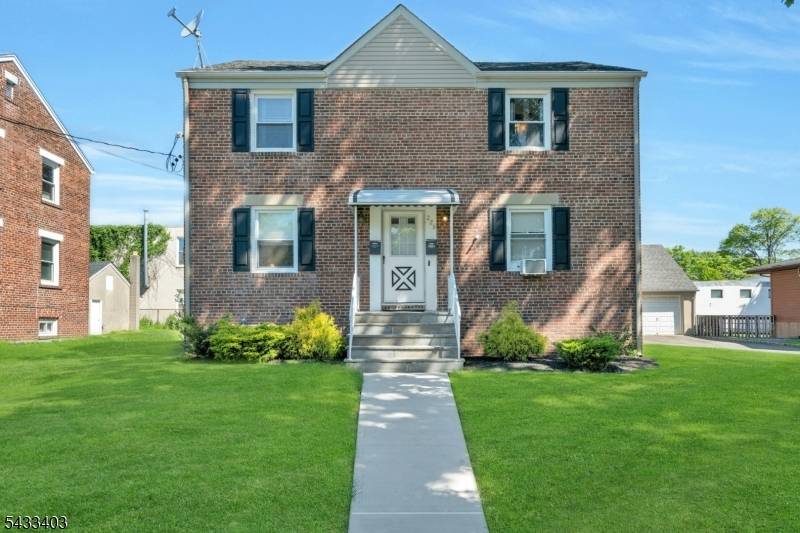 Well maintained two family home located just blocks from downtown Garwood and in close proximity to the train station, offering convenient access to NYC commuting.