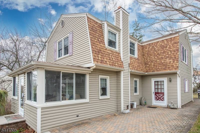 The home features a classic 1930s structure with substantial interior space, 3 bedrooms, 1 1 2 bathroom and a private yard with deck.