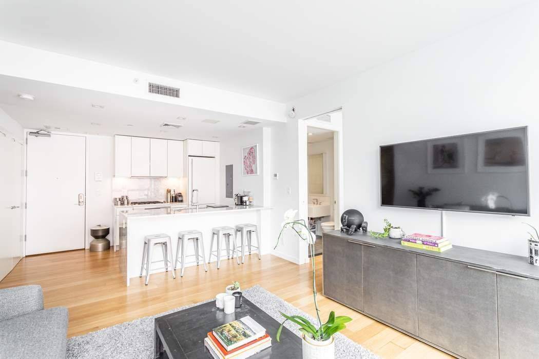 250 Bowery, with its striking contemporary glass and black metal industrial fac ade, designed by Morris Adjmi Architects is centered in the heart of Nolita.