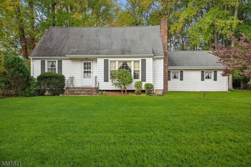 Location is everything ! This bright and spacious east facing 4 bedroom, 2 bath home offers 2, 042 sq.